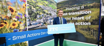 DAERA Minister Andrew Muir is pictured at the Just Transition Commission stand at this year's Balmoral Show.
