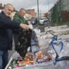 Thomas McIlhone and Damien Lindsay empty the latest donation of cans