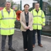 Infrastructure Minister Liz Kimmins pictured with DfI Rivers engineers Mark Scott and Owen McGivern at the Hilden River Control Structure. Picture: FfI