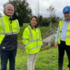 Mark Spence, Chief Executive, The Construction Employers Federation, Infrastructure Minister Liz Kimmins and David Magee, Building Director, Antrim Construction (developer of the Belmont Hall scheme)