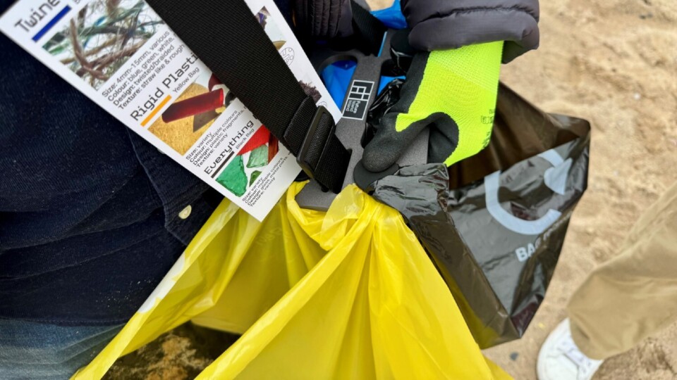 Colour-coded collection bags to separate material streams.