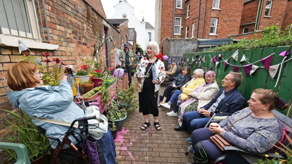 Wildflower Alley: Bríd Ruddy (centre), Chair of the College Park Avenue Residents Association. Photo: Justin Kernoghan.