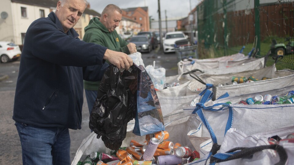 Thomas McIlhone and Damien Lindsay empty the latest donation of cans
